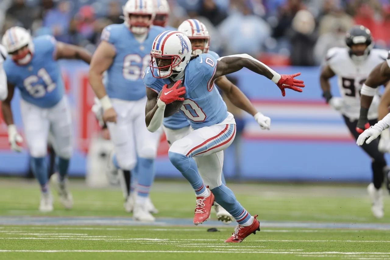 Tennessee Titans wide receiver Calvin Ridley (0) runs with the ball during the first half of an NFL football game against the Houston Texans, Jan. 5, 2025, in Nashville, Tenn. (AP Photo/Stew Milne)