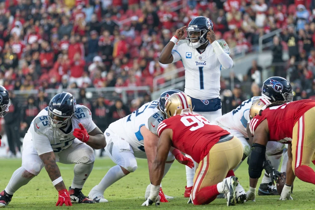 December 14, 2025; Santa Clara, California, USA; Tennessee Titans quarterback Cam Ward (1) signals to his teammates during the fourth quarter against the San Francisco 49ers at Levi’s Stadium. Mandatory Credit: Stan Szeto-Image of Sport
