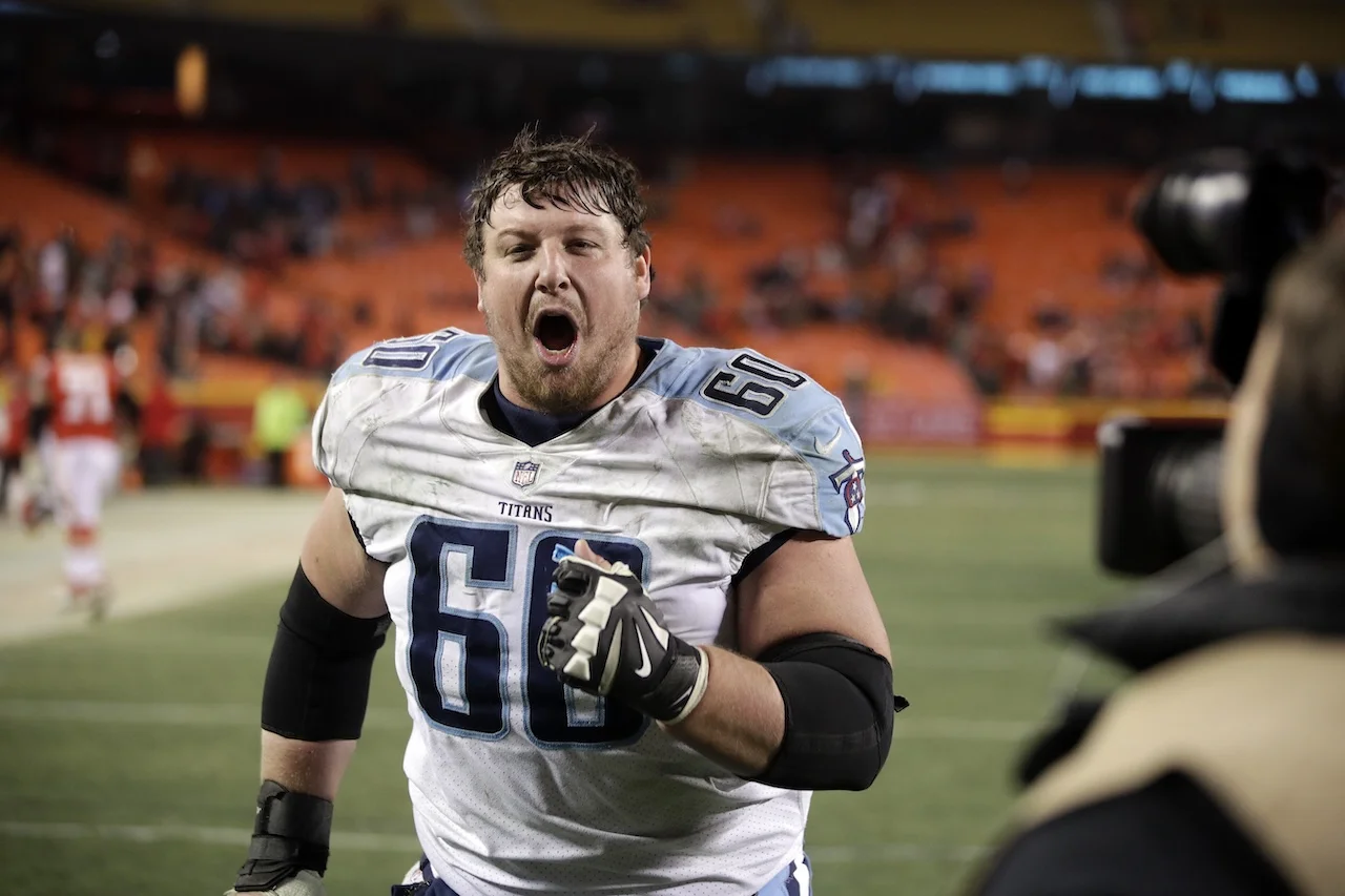 Tennessee Titans center Ben Jones (60) celebrates following an NFL wild-card playoff football game against Kansas City Chiefs, in Kansas City, Mo., Saturday, Jan. 6, 2018. The Tennessee Titans won 22-21. (AP Photo/Orlin Wagner)