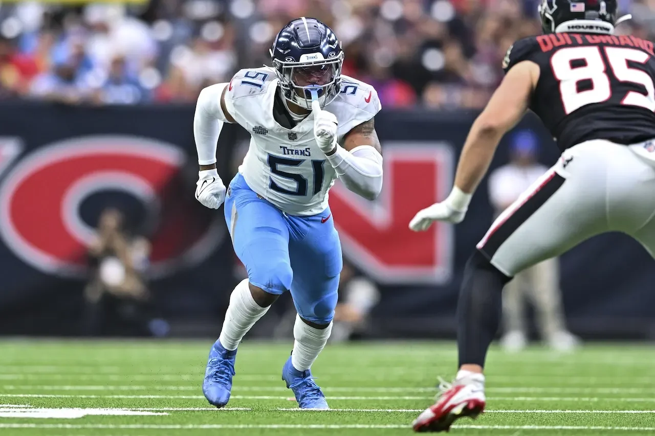 Tennessee Titans linebacker Cedric Gray (51) defends in coverage against Houston Texans tight end Teagan Quitoriano (85) during the second quarter of an NFL football game, Sunday, Nov 24, 2024 in Houston. The Titans defeated the Texans 32-27. (AP Photo/Maria Lysaker)