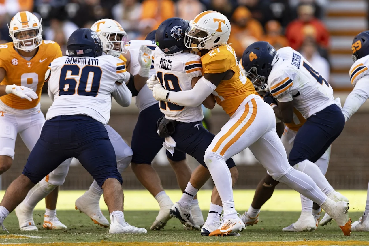 UTEP quarterback JP Pickles (19) is sacked by Tennessee defensive lineman James Pearce Jr. (27) during the first half of an NCAA college football game Saturday, Nov. 23, 2024, in Knoxville, Tenn. (AP Photo/Wade Payne)