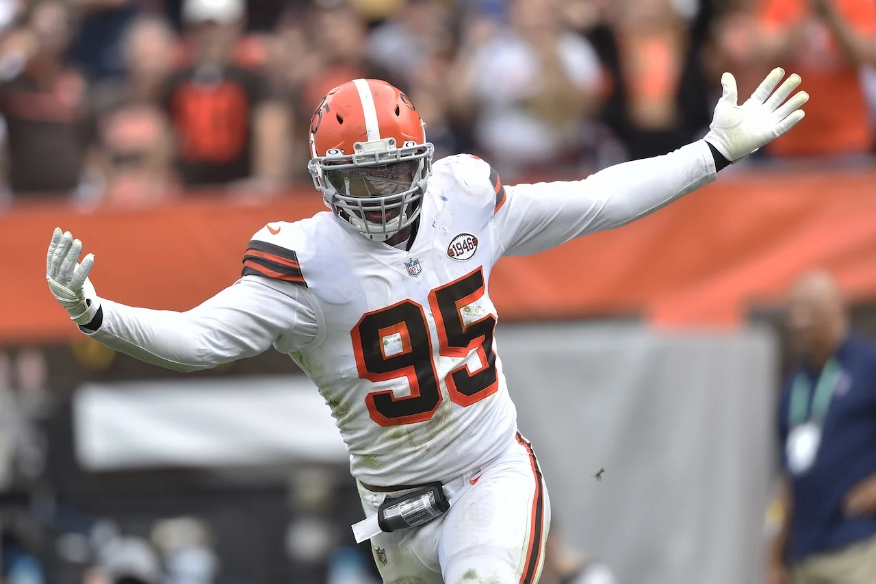 Cleveland Browns defensive end Myles Garrett celebrates after sacking Chicago Bears quarterback Justin Fields during the second half of an NFL football game, Sunday, Sept. 26, 2021, in Cleveland. (AP Photo/David Richard)