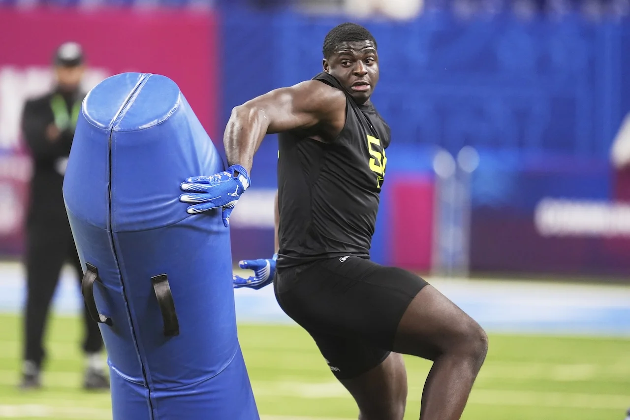 UCLA defensive lineman Oluwafemi Oladejo runs a drill at the NFL football scouting combine in Indianapolis, Thursday, Feb. 27, 2025. (AP Photo/Michael Conroy)