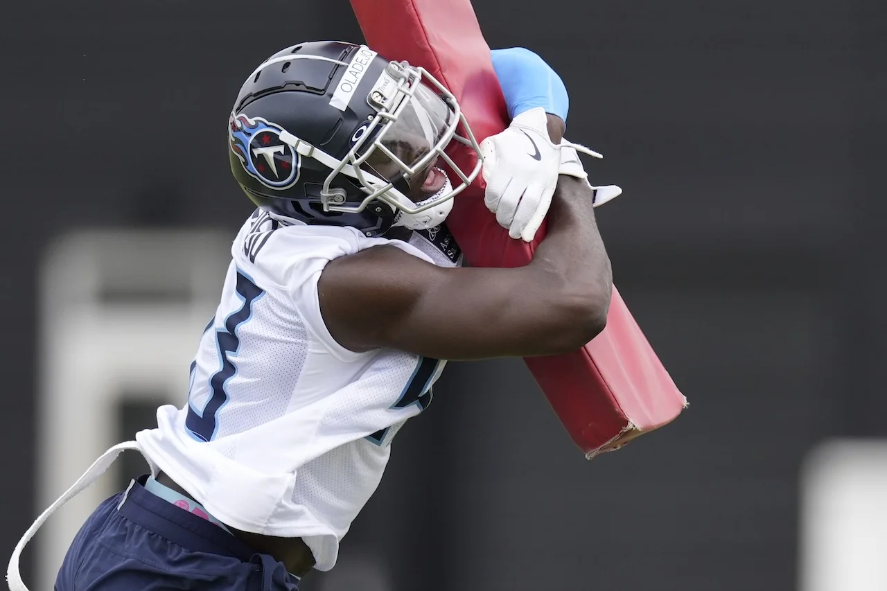 Tennessee Titans linebacker Oluwafemi Oladejo runs through a drill during the NFL football team's rookie minicamp Saturday, May 10, 2025, in Nashville, Tenn. (AP Photo/George Walker IV)