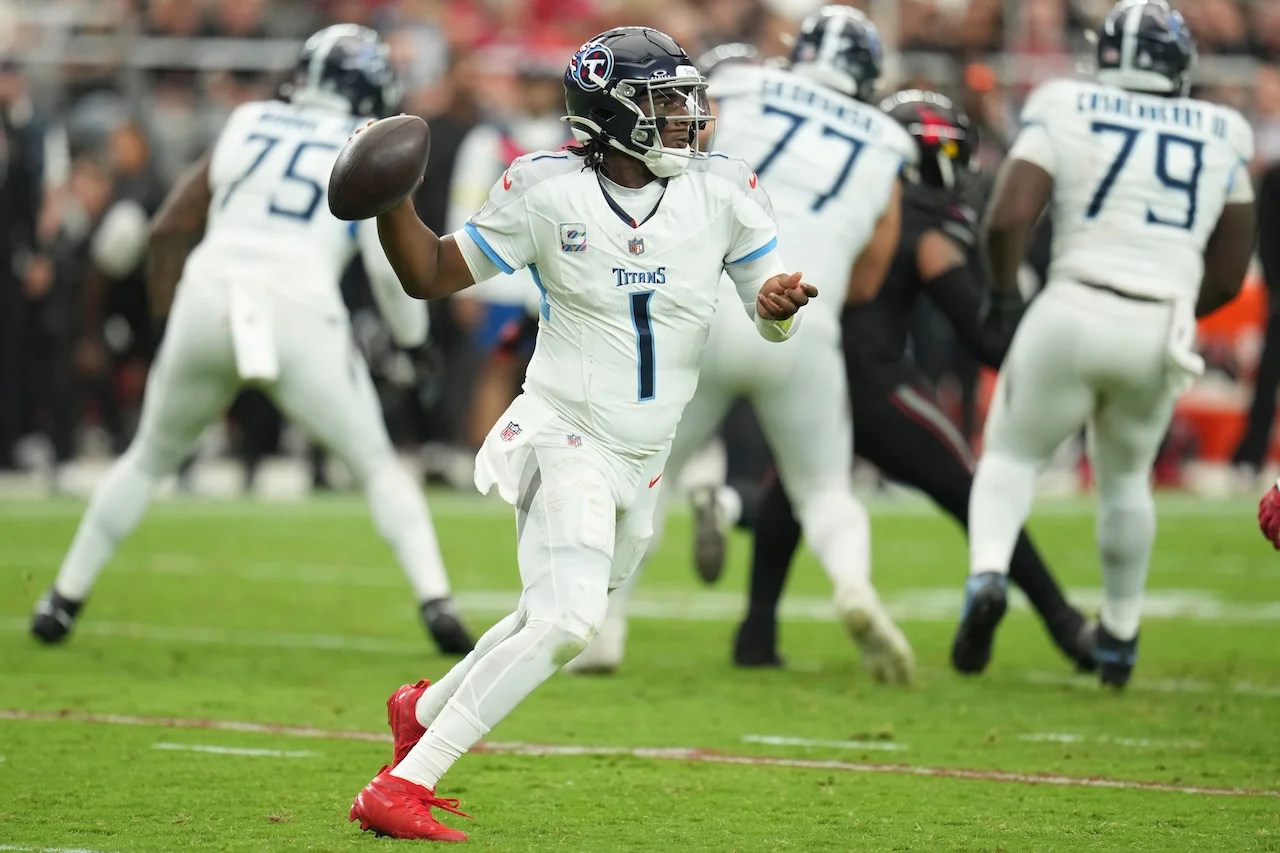 Tennessee Titans quarterback Cam Ward (1) looks to throw a pass during the second half of an NFL football game against the Arizona Cardinals, Sunday, Oct. 5, 2025, in Glendale, Ariz. (AP Photo/Rick Scuteri)
