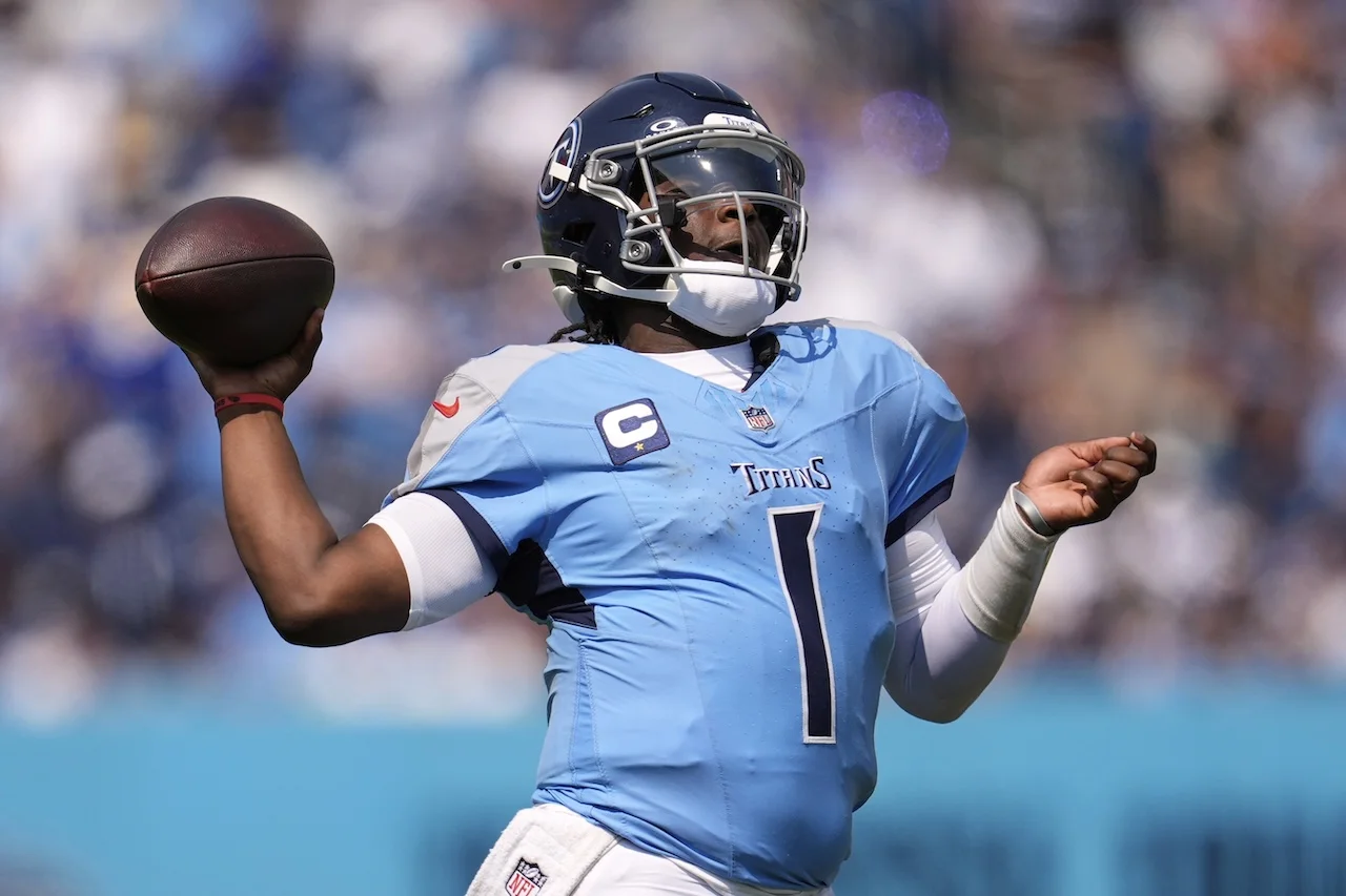 Tennessee Titans quarterback Cam Ward throws a touchdown pass during the first half of an NFL football game against the Los Angeles Rams, Sunday, Sept. 14, 2025, in Nashville, Tenn. (AP Photo/George Walker IV)